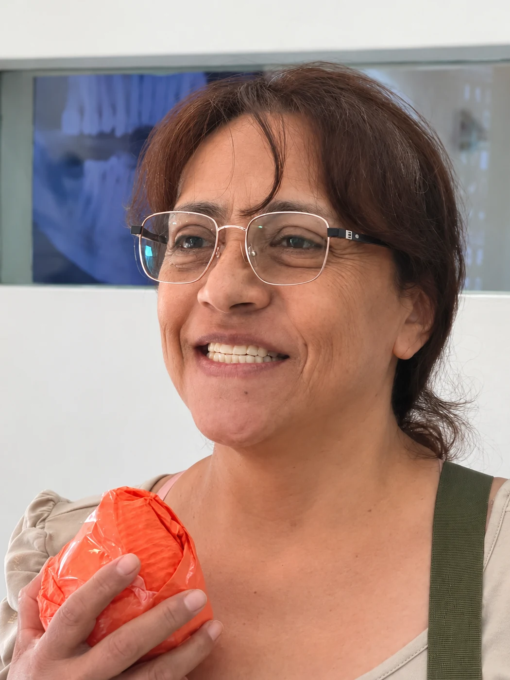 All-on-6 patient showing new smile after treatment