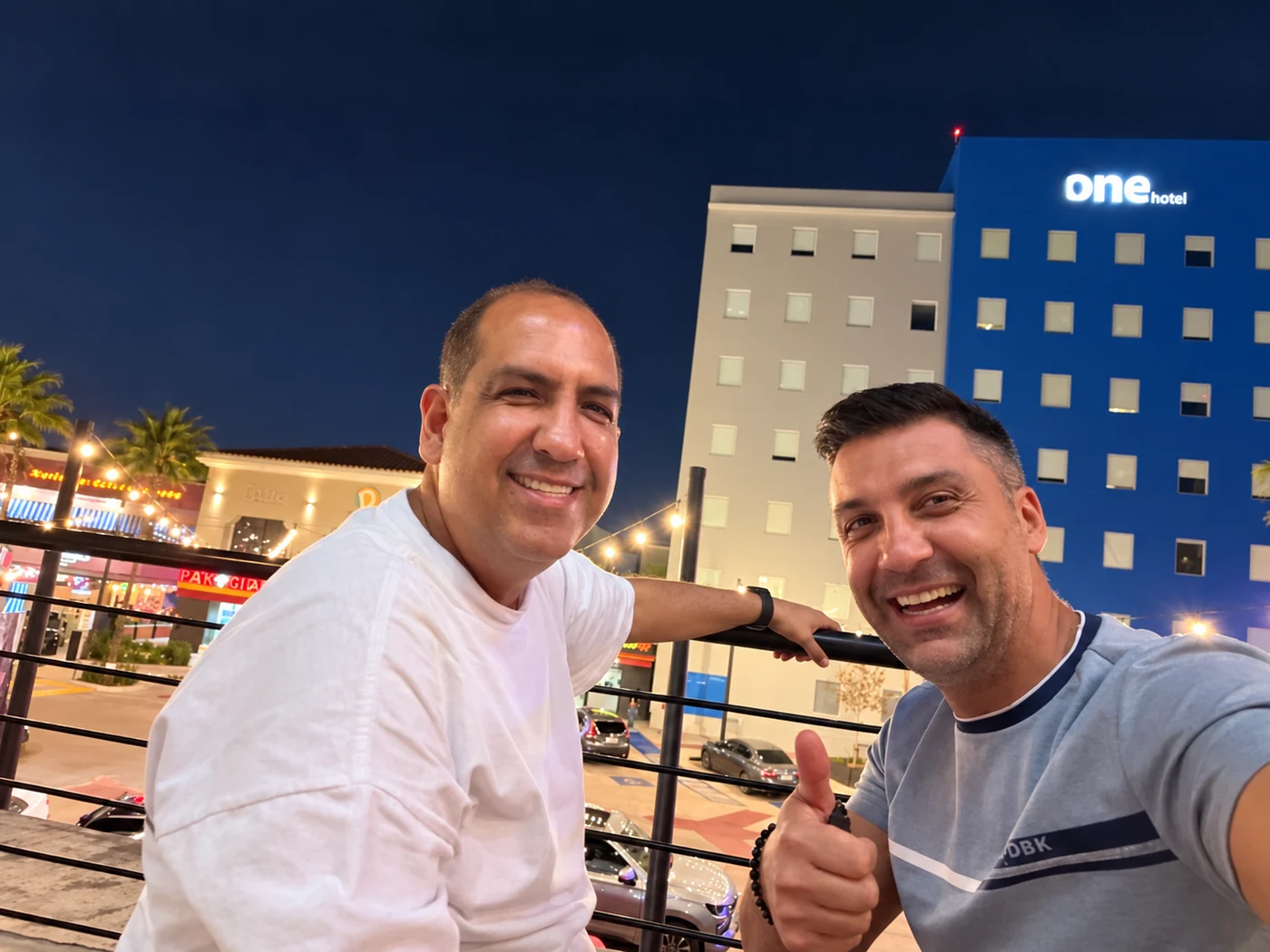 All-on-6 patient smiling with Dr. Adrian Moisa