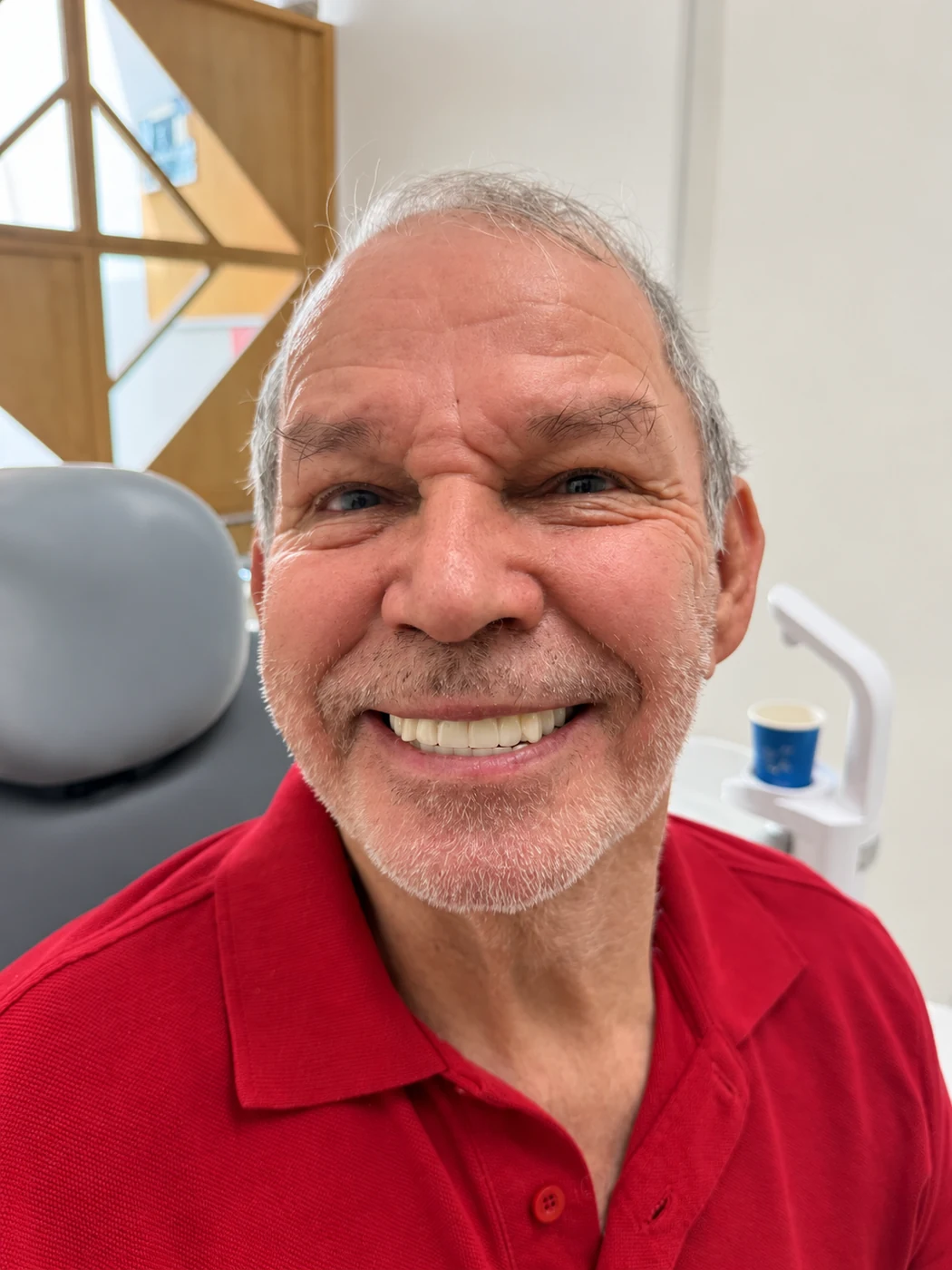 All-on-6 patient showing new smile after treatment